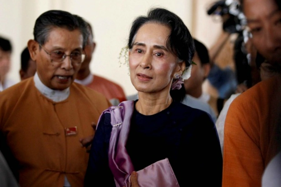 Myanmar's National League for Democracy leader Aung San Suu Kyi leaves after she attended as an observer for opening of the ne...parliament to choose the first democratically elected government since the military took power in 1962 (Reuters/Soe Zeya Tun).