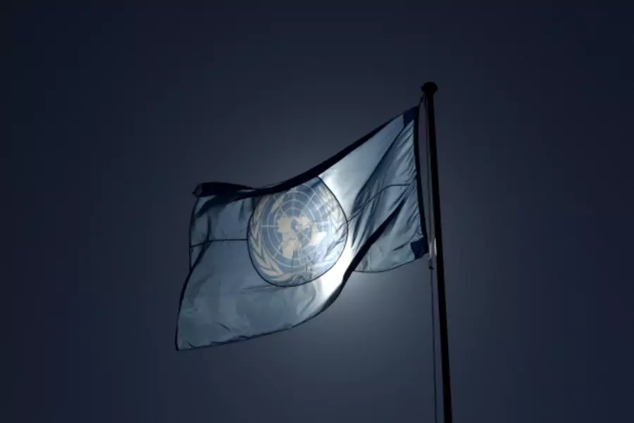 A United Nations flag flies on a mast at their European headquarters in Geneva. (Denis Balibouse/Reuters)