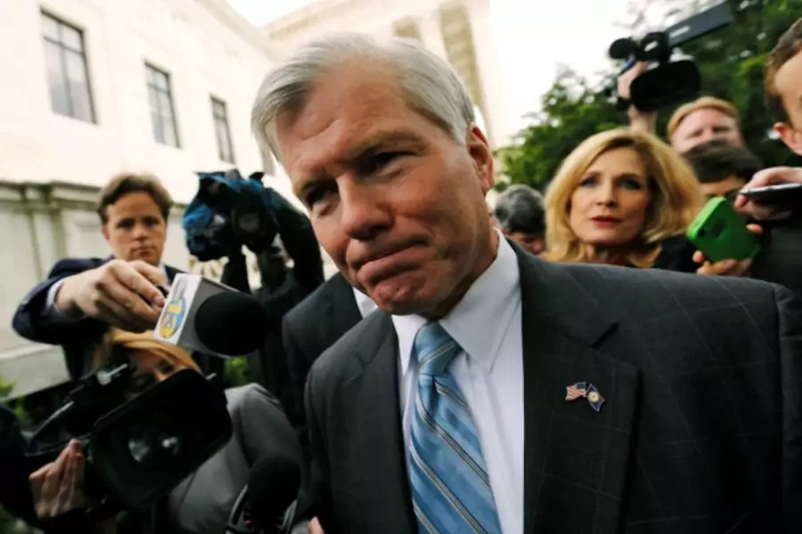 Former Virginia Governor Bob McDonnell is trailed by reporters as he departs after his appeal of his 2014 corruption convictio...ing that could hem in federal prosecutors as they go after bribery charges against other politicians (Reuters/Jonathan Ernst).