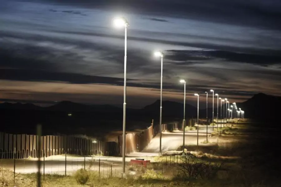 The Arizona-Mexico border fence near Naco, Arizona, March 29, 2013. REUTERS/Samantha Sais