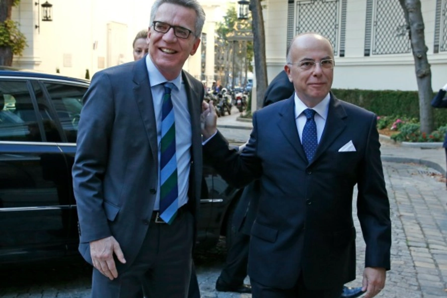 French Interior Minister Bernard Cazeneuve (R) greets his German counterpart Thomas de Maiziere in Paris, France, August 23, 2016. (Pascal Rossignol/Reuters)