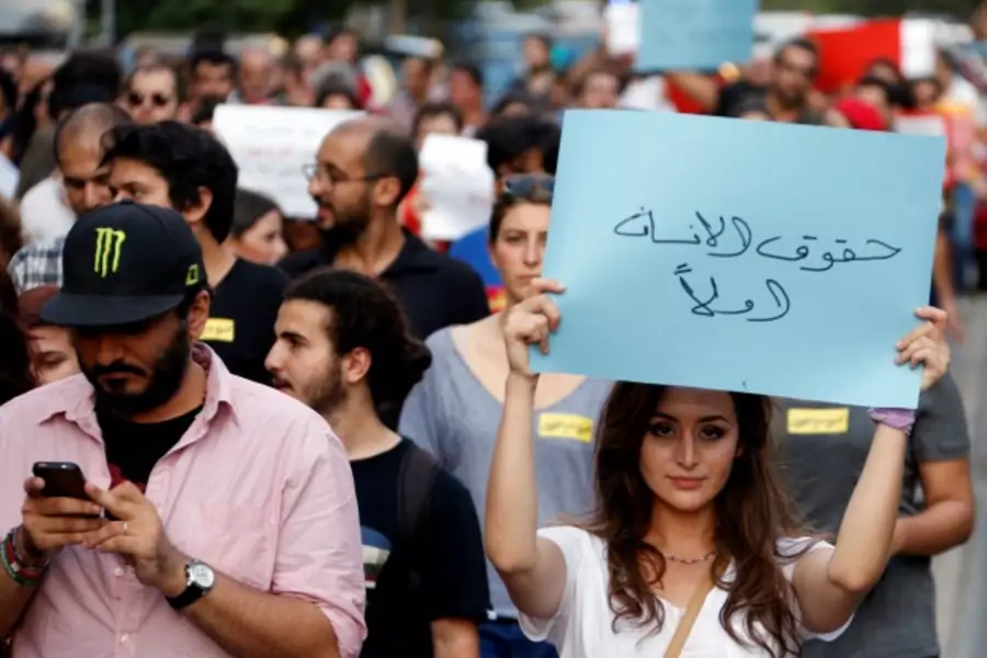People attend a demonstration against sectarianism, also calling for abolishing curfews put on Syrian refugees in Beirut, Lebanon (Mohamed Azakir/Reuters).