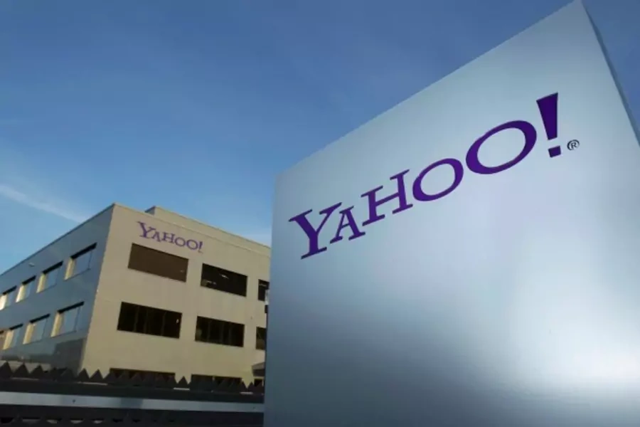 A Yahoo logo is pictured in front of a building in Rolle, 30 km (19 miles) east of Geneva, December 12, 2012. (Denis Balibouse/Reuters)