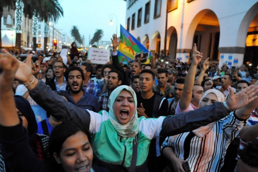 Protests take part in a rally called by the February 20 Movement in Rabat after a fishmonger in the northern town of Al Hoceima was crushed to death inside a rubbish truck as he tried to retrieve fish confiscated by police (Stringer/Reuters).