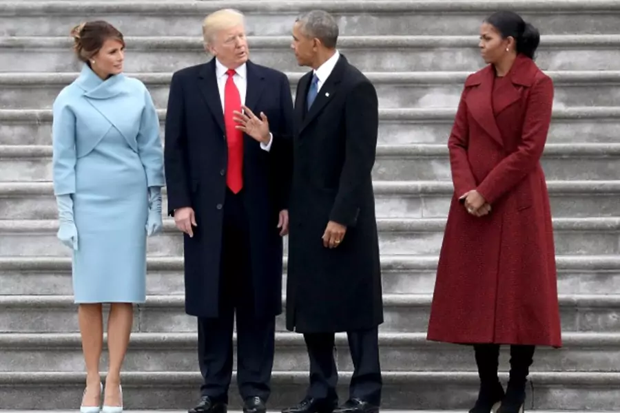 President Donald Trump with First Lady Melania Trump and former President Barack Obama with Michelle Obama at the inauguration on January 20, 2017. (Photo: Reuters/Pool New) 