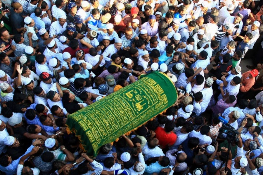 FILE PHOTO - Supporters carry the coffin of Ko Ni, a prominent member of Myanmar's Muslim minority and legal adviser for Myanmar's ruling National League for Democracy, after he was shot dead, in Yangon, Myanmar January 30, 2017. REUTERS/Mg Nyi Nyi