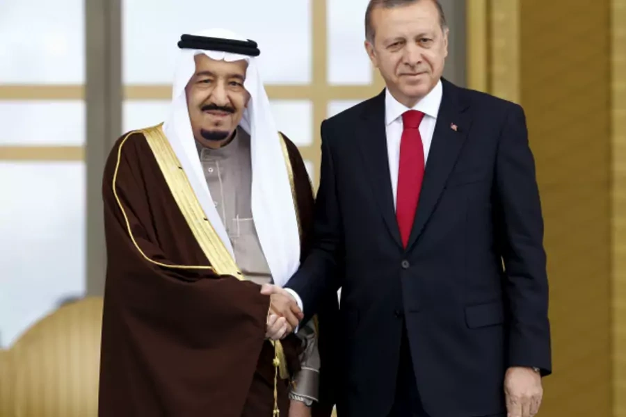 Turkey's President Tayyip Erdogan (R) and Saudi King Salman shake hands during a welcoming ceremony in Ankara, Turkey (Umit Bektas/Reuters).