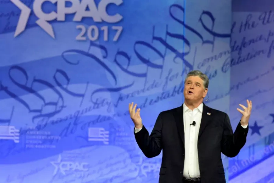 Conservative TV and radio personality Sean Hannity gestures during remarks during the opening day of the Conservative Political Action Conference (Mike Theiler/Reuters).