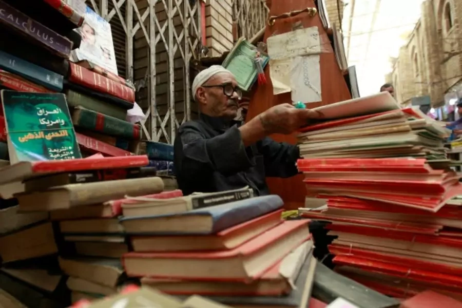 A vendor sells books at Mutanabi Street in Baghdad (Mohammed Ameen/Reuters).