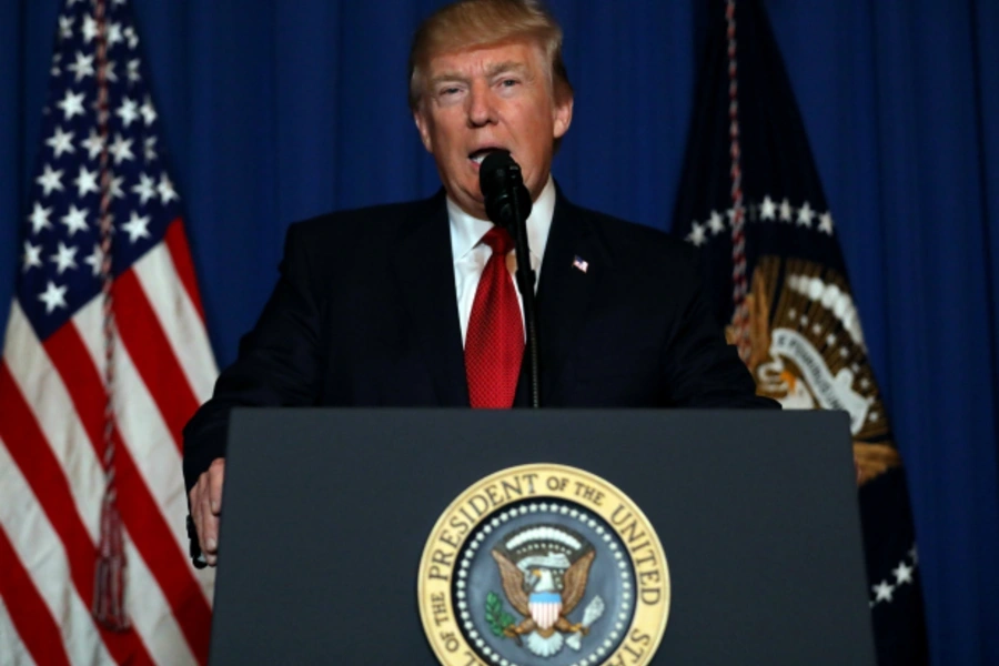 U.S. President Donald Trump delivers an statement about missile strikes on a Syrian airbase, at his Mar-a-Lago estate in West Palm Beach, Florida (Carlos Barria/Reuters).