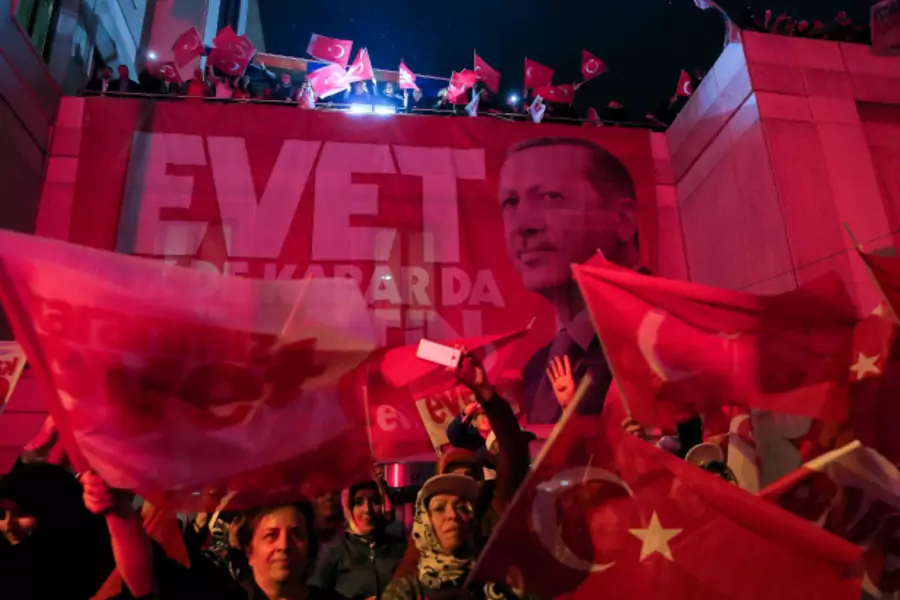 Supporters of Turkish President Tayyip Erdogan celebrate in Istanbul (Huseyin Aldemir/Reuters).