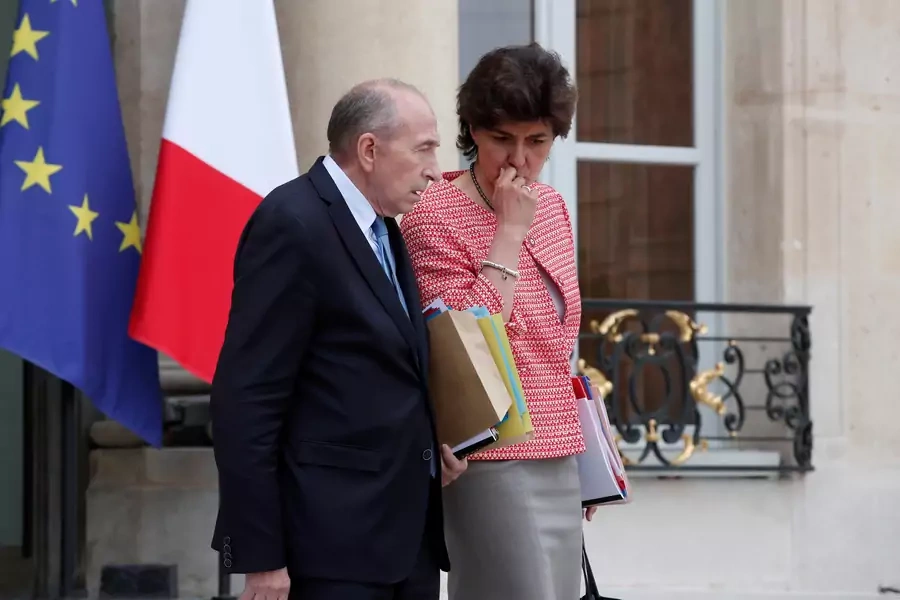French Interior minister Gerard Collomb and the Minister of the Armed Forces Sylvie Goulard leave the Elysee Palace after a weekly cabinet meeting in Paris, France, May 24, 2017.