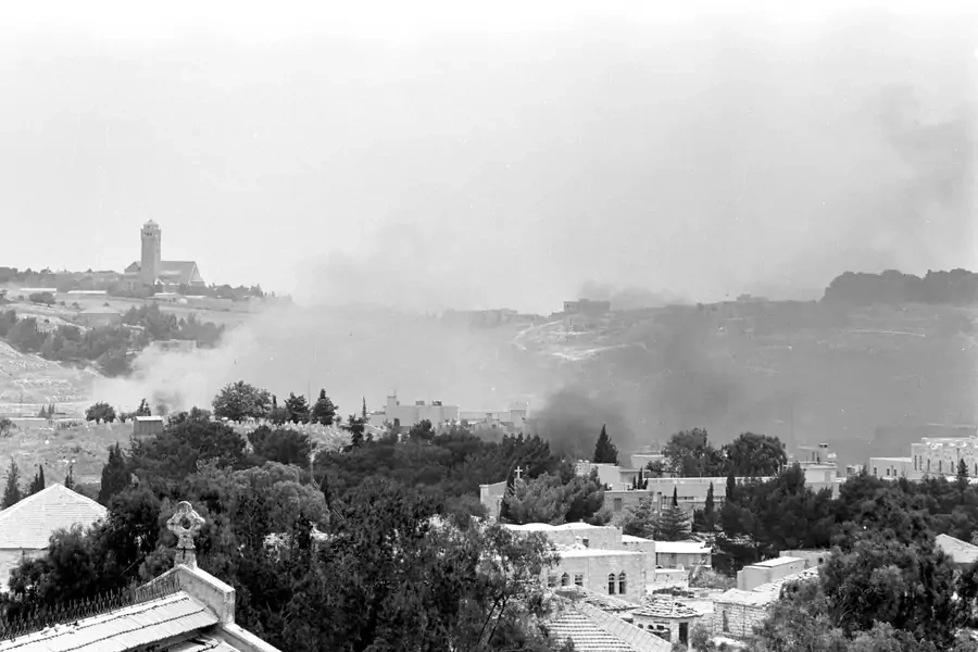 Smoke rises in East Jerusalem during a battle in the 1967 Middle East War, widely known as the Six Day War, in this picture released on June 4, 2007 by Israel's Defence Ministry (Handout/Reuters).