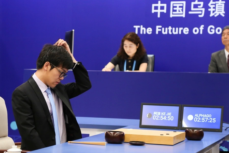 2017Chinese Go player Ke Jie reacts during his first match with Google's artificial intelligence program AlphaGo at the Future of Go Summit in Wuzhen, Zhejiang province, China May 23, 2017