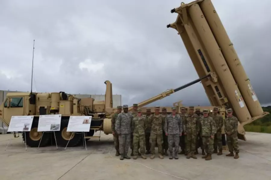 U.S. Air Force Gen. Terrence J. O’Shaughnessy, Pacific Air Forces commander, meets with soldiers in front of a THAAD launcher.