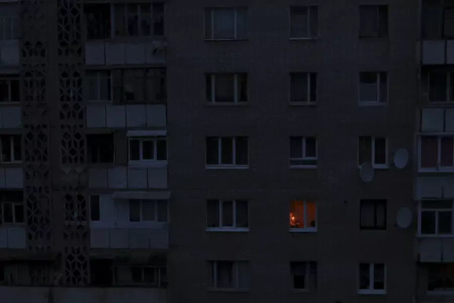 A single light illuminates a room during a blackout at a residential building in Simferopol, Crimea November 24, 2015.