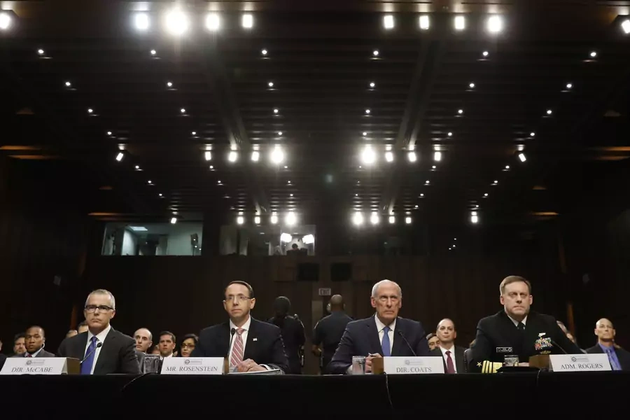 Acting FBI Director Andrew McCabe, Deputy Attorney General Rod Rosenstein, Director of National Intelligence Daniel Coats, and National Security Agency Director Michael Rogers testify before the Senate Intelligence Committee on June 7, 2017