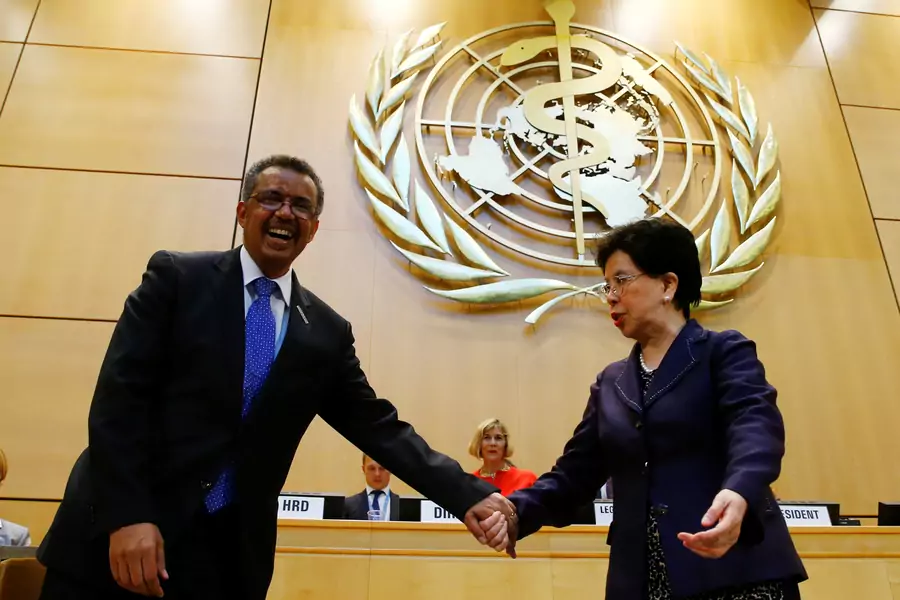 Outgoing WHO Director General Margaret Chan (R) congratulates Tedros Adhanom Ghebreyesus after his election as the next WHO director general during the Seventieth World Health Assembly in Geneva, Switzerland, on May 23, 2017.