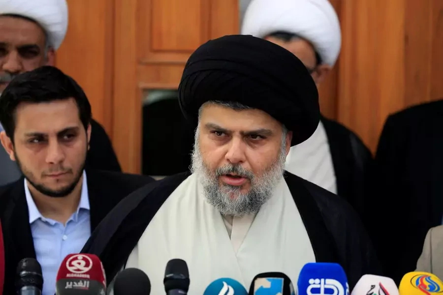 Iraqi Shi'ite cleric Moqtada al-Sadr speaks during a media conference with Iraqi Defense Minister Arfan al-Hayali and Iraq's Interior Minister Qasim al-Araji (not pictured) in Najaf, Iraq (Alaa Al-Marjani/Reuters).