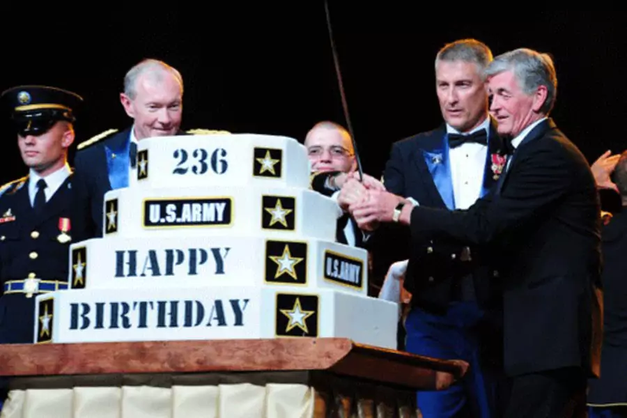Army Chief of Staff Gen. Martin Dempsey, Sergeant Major of the Army Raymond F. Chandler III, and Secretary of the Army John McHugh, prepare to cut the cake at the 236th Army Birthday Ball on June 11, 2011. 