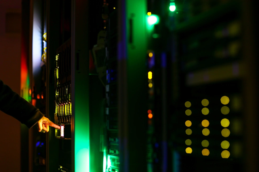 A man poses inside a server room at an IT company in this June 19, 2017 illustration photo. 