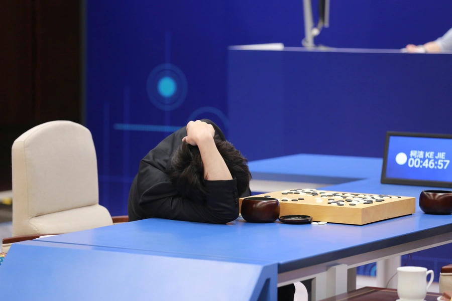 Chinese Go player Ke Jie reacts during his second match against Google's artificial intelligence program AlphaGo at the Future of Go Summit in Wuzhen, Zhejiang province, China May 25, 2017. 