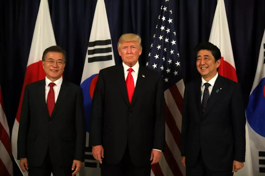 U.S. President Donald Trump meets South Korea's President Moon Jae-In and Japanese Prime Minister Shinzo Abe ahead the G20 leaders summit in Hamburg, Germany on July 6, 2017. 
