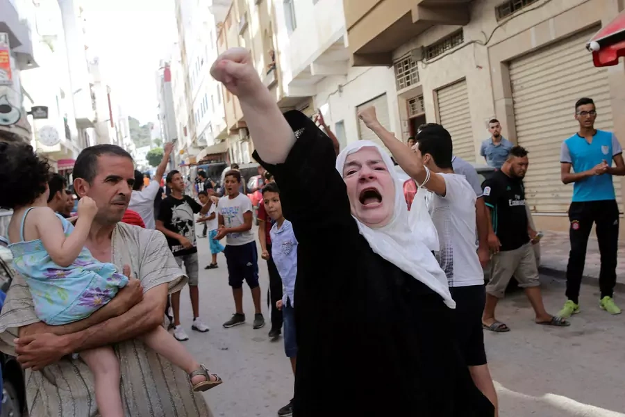 A woman shouts slogans during a demonstration against official abuses and corruption in the town of al-Hoceima, Morocco (Youssef Boudlal/Reuters).