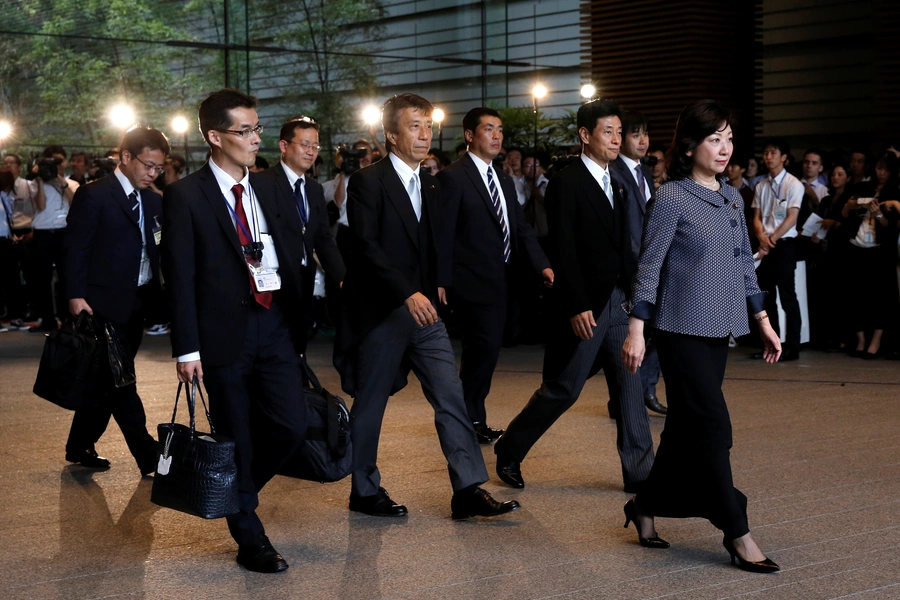 Japan's new Internal Affairs Minister Seiko Noda and new Agriculture, Forestry, and Fisheries Minister Ken Saito leave Prime Minister Shinzo Abe's official residence on August 3, 2017.