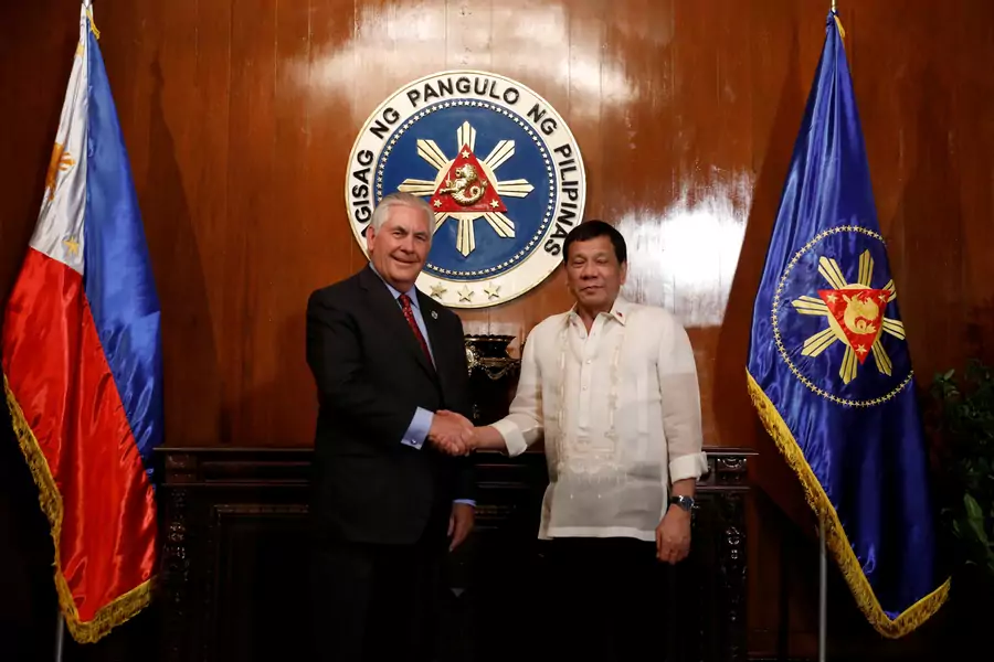 Philippine President Rodrigo Duterte shakes hands with visiting U.S Secretary of State Rex Tillerson during a meeting at the presidential palace in Manila, Philippines on August 7, 2017.