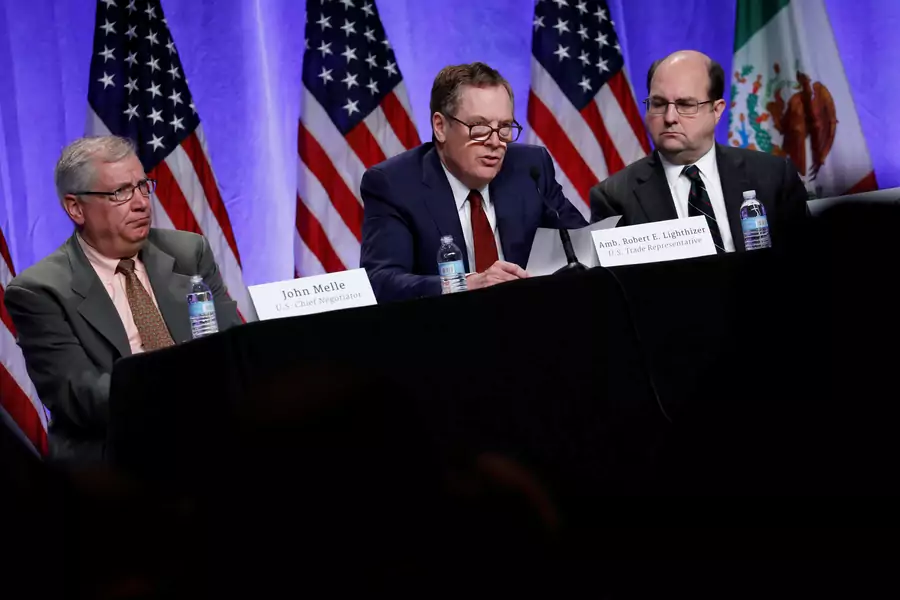 U.S. Trade Representative Robert Lighthizer, flanked by U.S. Chief Negotiator John Melle and U.S. General Counsel Stephen Vaughn, speaks at a news conference prior to the inaugural round of NAFTA renegotiations in Washington, D.C. August 16, 2017.