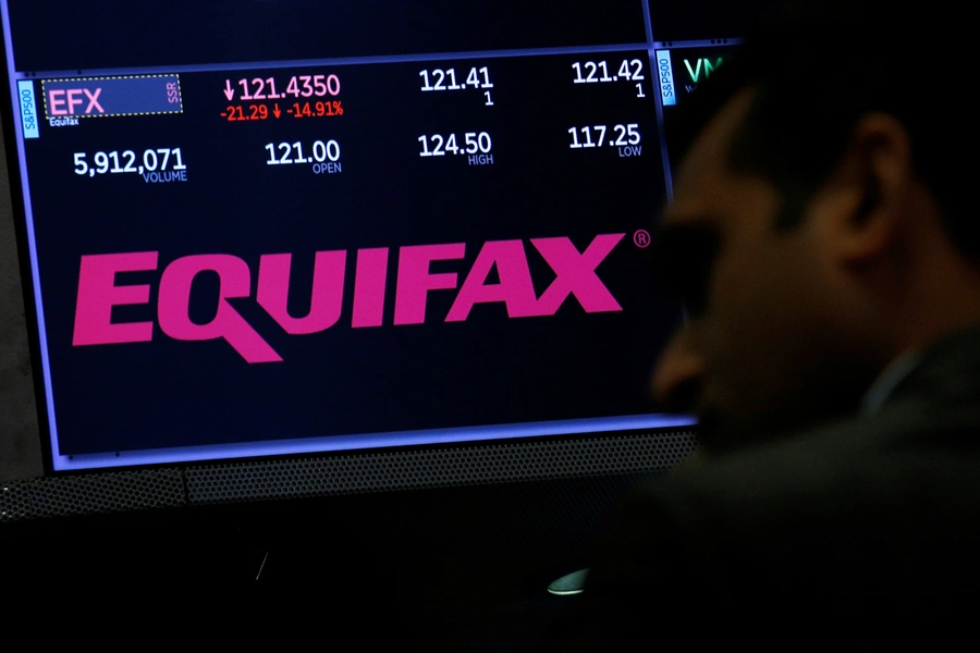 Trading information and the company logo are displayed on a screen where the stock is traded on the floor of the New York Stock Exchange on September 8, 2017.