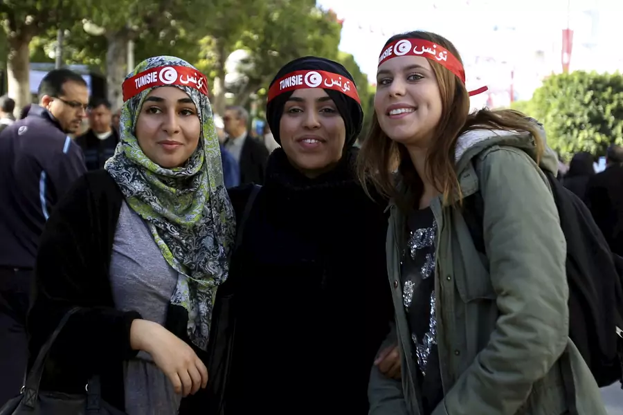 Tunisian women pose during celebrations marking the fifth anniversary of Tunisia's 2011 revolution, in Habib Bourguiba Avenue in Tunis, Tunisia January 14, 2016. Tunisia is seen as leader for asserting women's rights in the region.