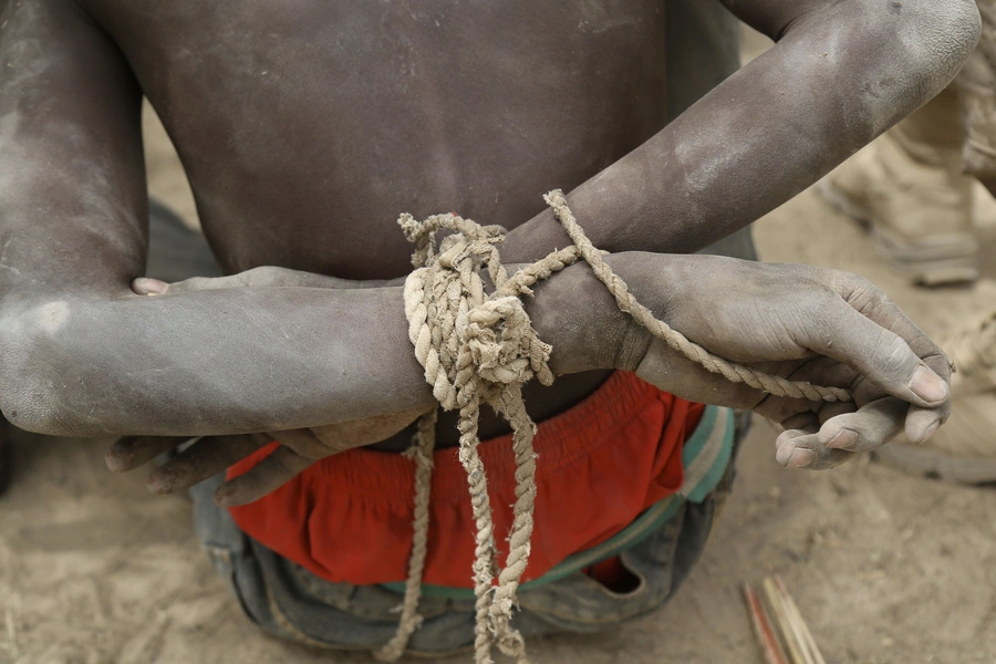 A prisoner, suspected of being a member of insurgent group Boko Haram, in the field base of Chadian soldiers in Gambaru, Nigeria, February 26, 2015. Thousands of others have been arrested and detained indefinitely in the fight against the terrorist group.