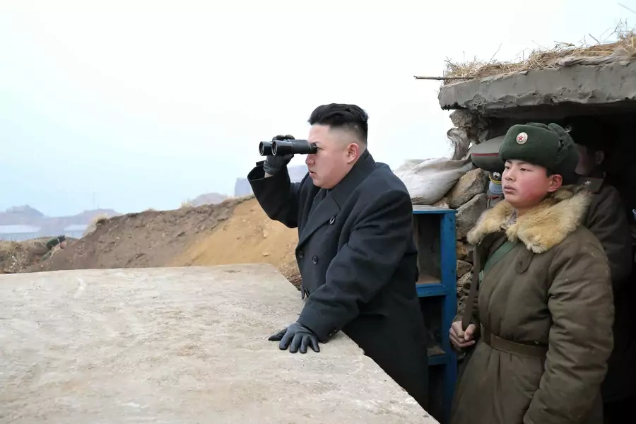 Kim Jong-Un looks for a signal. 