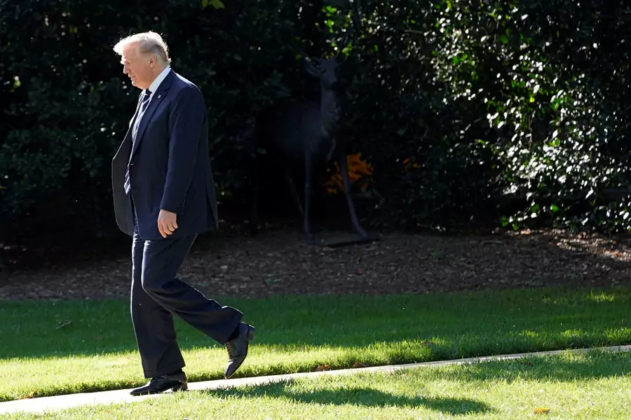 U.S. President Donald J. Trump walks from the White House in Washington, DC, before his departure to Greer, South Carolina, on October 16, 2017.