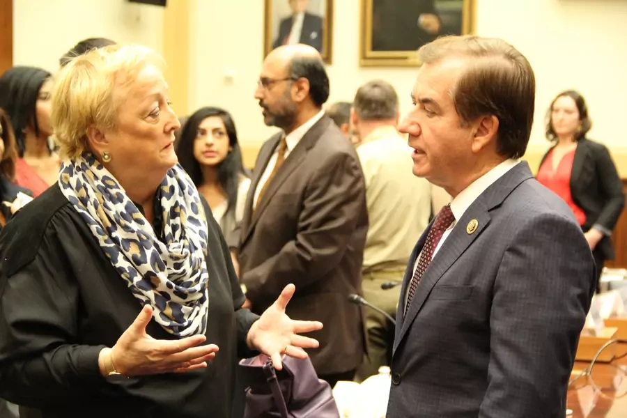 Foreign Affairs Committee Chairman Ed Royce (R-CA) and Monica McWilliams, a Northern Ireland peace negotiator currently training Syrian women involved in the peace process, discuss testimonies presented at a 2016 HFAC hearing.