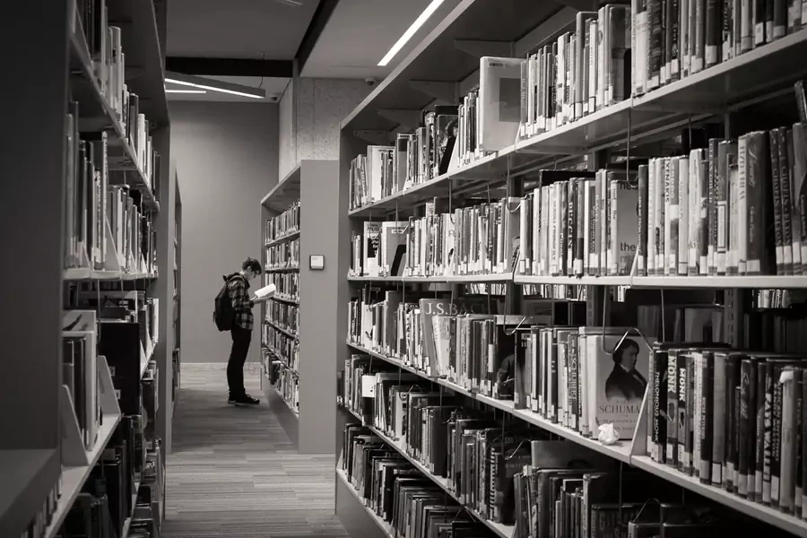 Student in the stacks