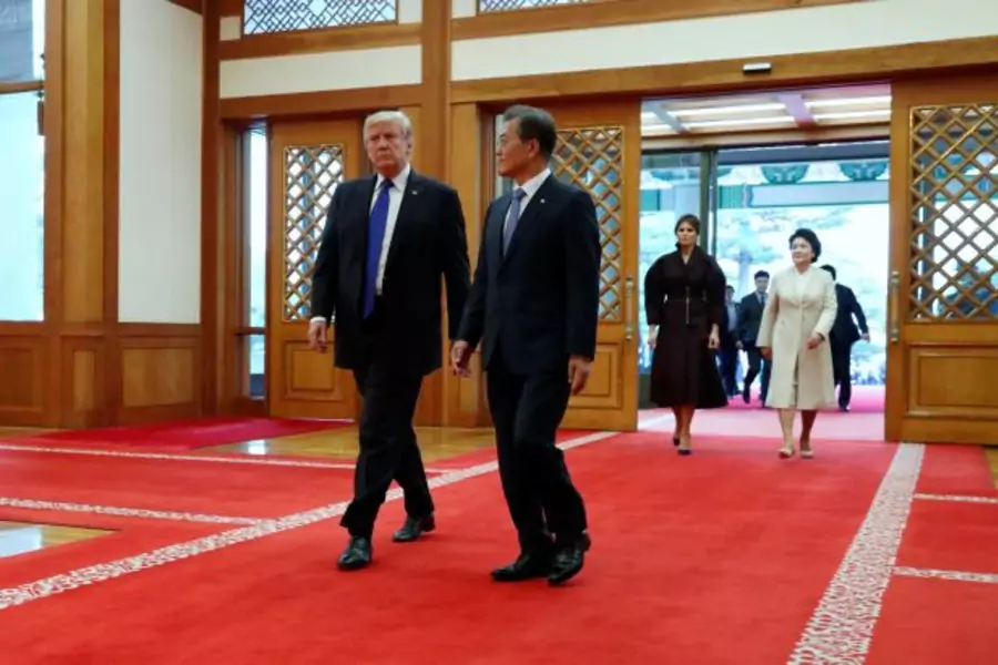 U.S. President Donald Trump arrives with South Korea's President Moon Jae-in at the Blue House in Seoul, South Korea November 7, 2017.