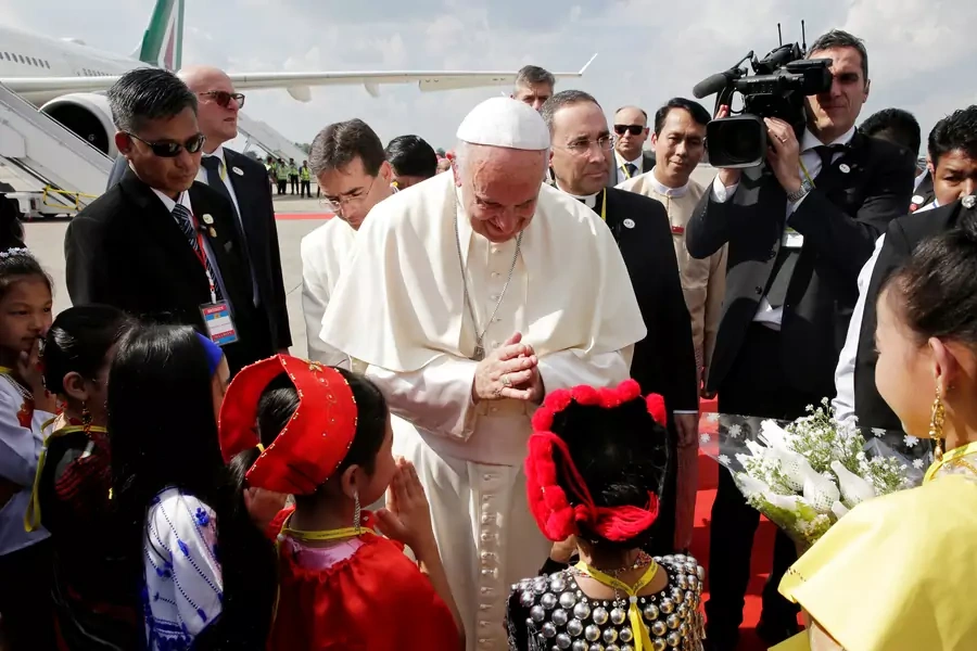 Pope Francis is welcomed as he arrives at Yangon International Airport, Myanmar on November 27, 2017.
