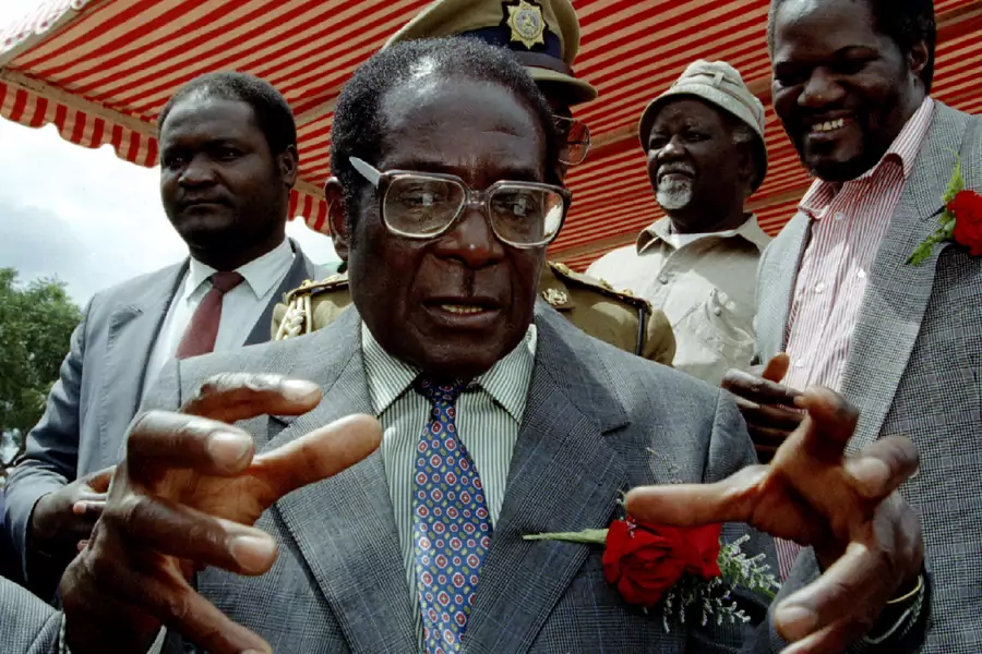 Zimbabwe's President Robert Mugabe outside the capital, Harare, Zimbabwe, April 7, 1995. This photo was taken shortly before his marriage to his second wife, Grace, in 1996, and after the death of his first, Sally, in 1992.