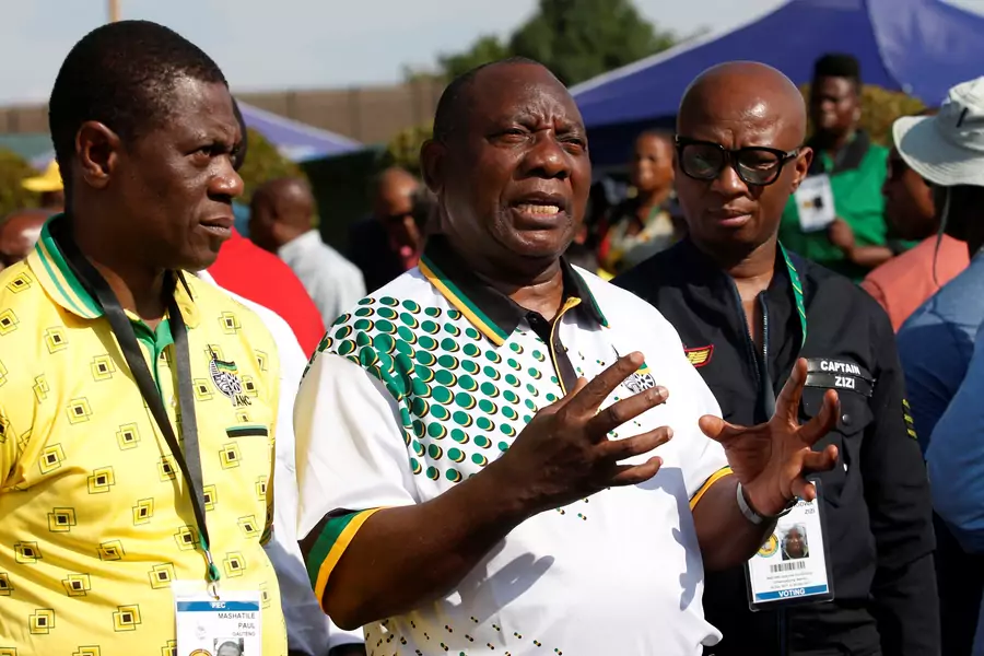 ANC President Cyril Ramaphosa with the new ANC Treasurer General Paul Mashatile (L) at the Nasrec Expo Centre, where the 54th National Conference of the ruling party is taking place in Johannesburg, South Africa December 19, 2017.