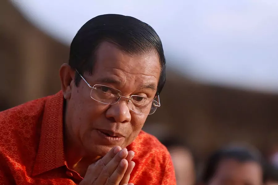 Cambodia's Prime Minister Hun Sen greets as he holds a ceremony at the Angkor Wat temple to pray for peace and stability in Cambodia, in Siem Reap province, Cambodia on December 3, 2017.