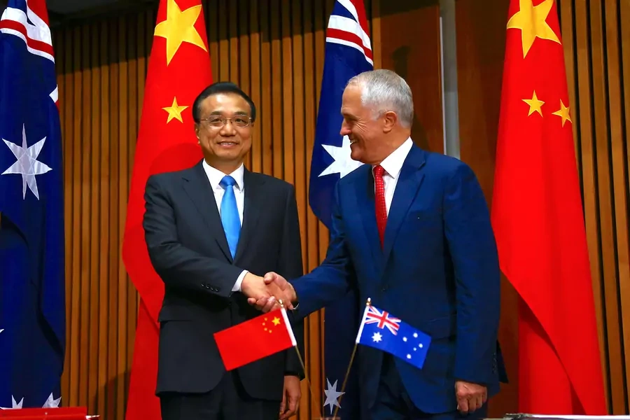 Australian Prime Minister Malcolm Turnbull and Chinese Premier Li Keqiang shake hands before a ceremony in Canberra, Australia.