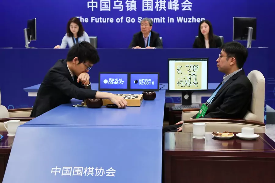 Chinese Go player Ke Jie (left) competes against Google's artificial intelligence program AlphaGo during their second match at the Future of Go Summit in Wuzhen, China in May 2017.
