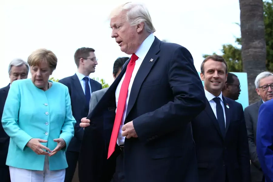 Angela Merkel, Donald J. Trump, and Emmanuel Macron during a family photo at the G7 Summit in Sicily, Italy on May 27, 2017. 