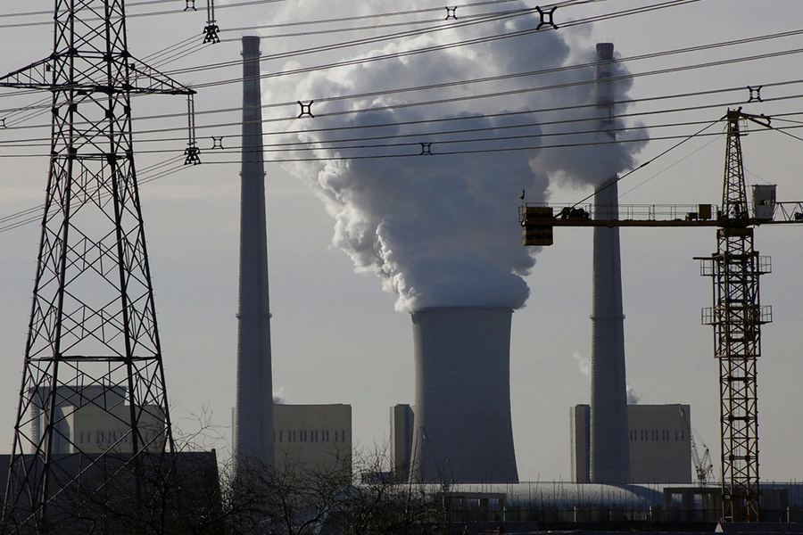 A coal-fired power plant is pictured near a construction site in Beijing, China, December 9, 2016. REUTERS/Jason Lee