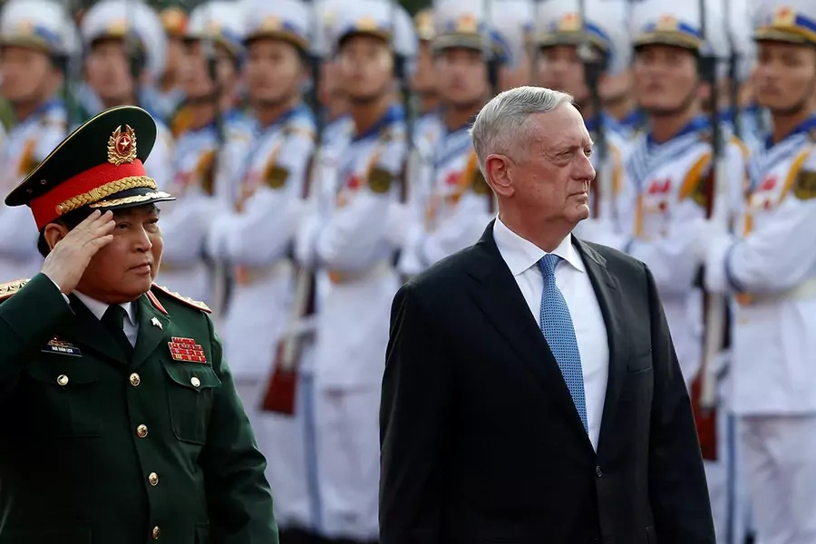 U.S. Secretary of Defense Jim Mattis (R) and Vietnam's Defence Minister Ngo Xuan Lich review the guard of honor during a welcoming ceremony in Hanoi, Vietnam on January 25, 2018.