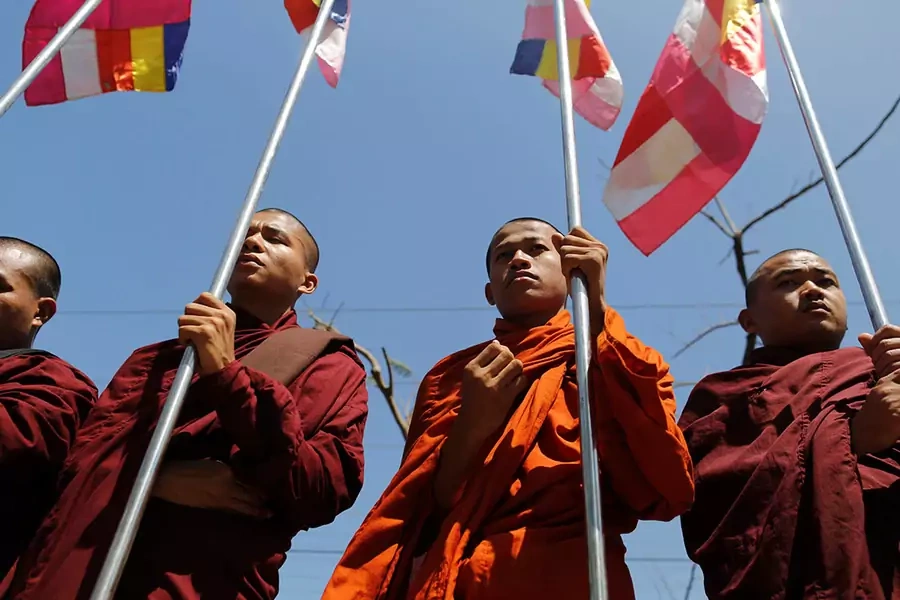 Buddhist monks protest while Malaysian NGO's aid ship carrying food and emergency supplies for Rohingya Muslims arrives at the port in Yangon, Myanmar on February 9, 2017.