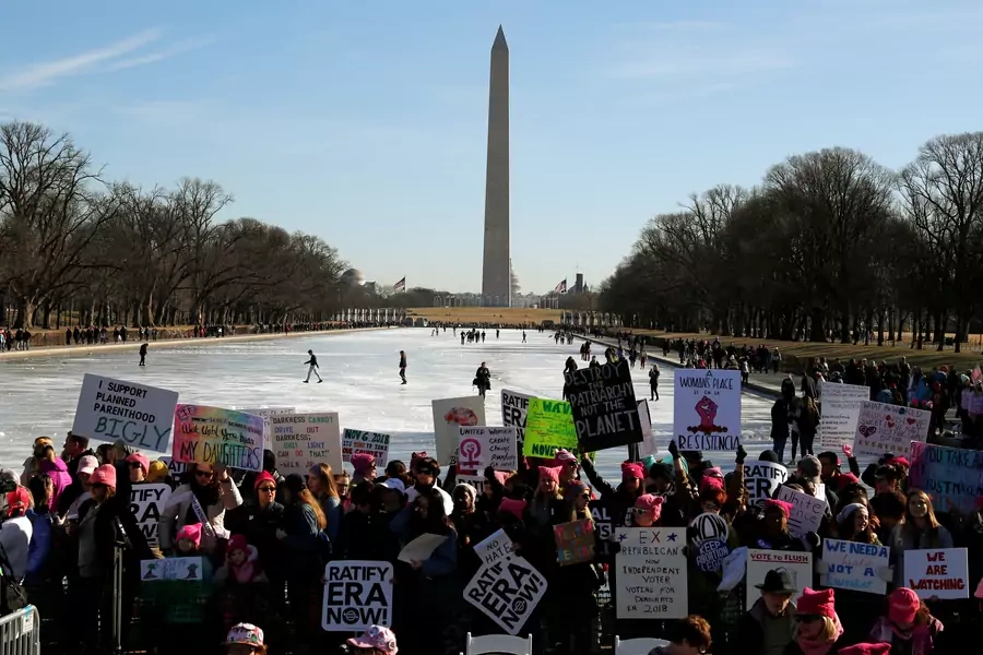 People participate in the Second Annual Women's March in Washington, U.S. January 20, 2018.